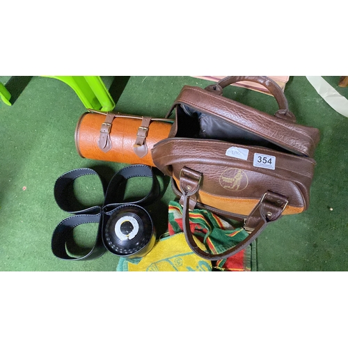 354 - Four vintage Thomas Taylor Size 5 carpet bowls and bags.