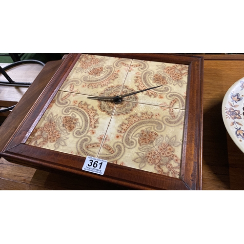 361 - A vintage metal kitchen clock and another.