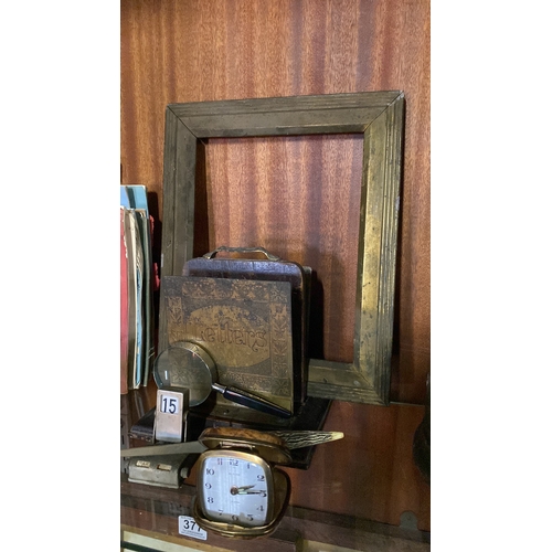 374 - An antique brass frame & assortment of various items.