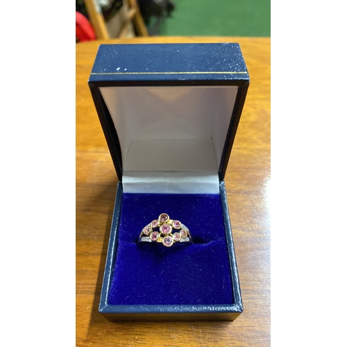 380 - A 9ct gold pink tourmaline and diamond ring.