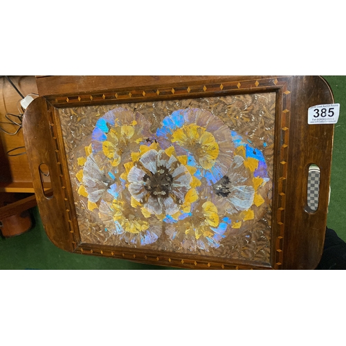 385 - A decorative two handled wooden tray with butterfly wing design.