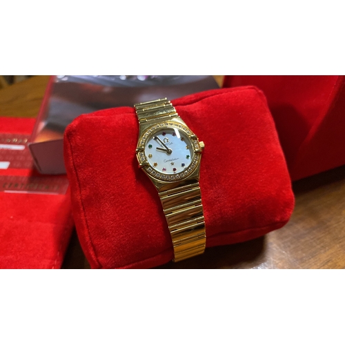 391 - A magnificent 18ct gold ladies Omega Constellation wristwatch, complete with box, outer box & all as... 