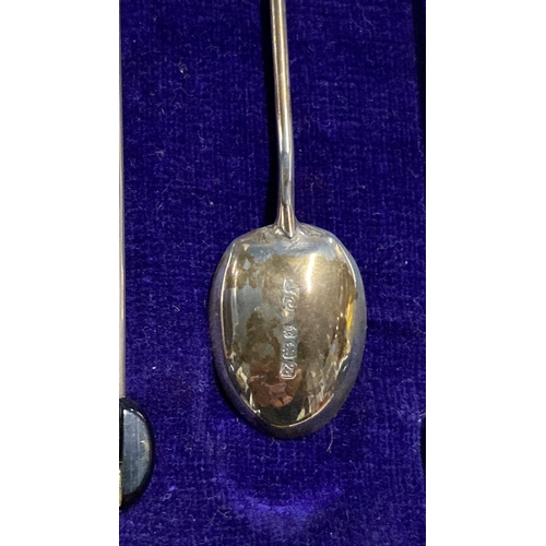 395 - A cased set of six Sterling Silver coffee bean teaspoons.