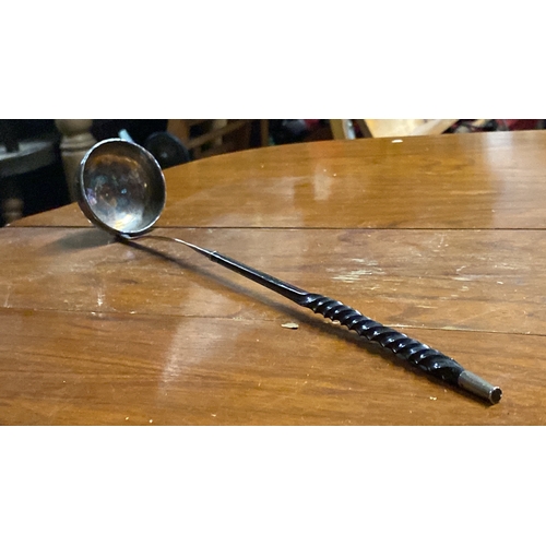 396 - A Georgian Silver punch ladle with whalebone handle circa 1790.