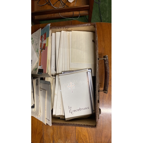 403 - A vintage leather case (a/f) and a lot of vintage sympathy cards etc.