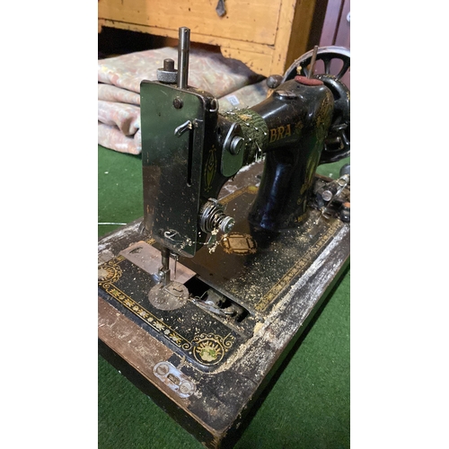 404 - An antique Vibra sewing machine and case for restoration.