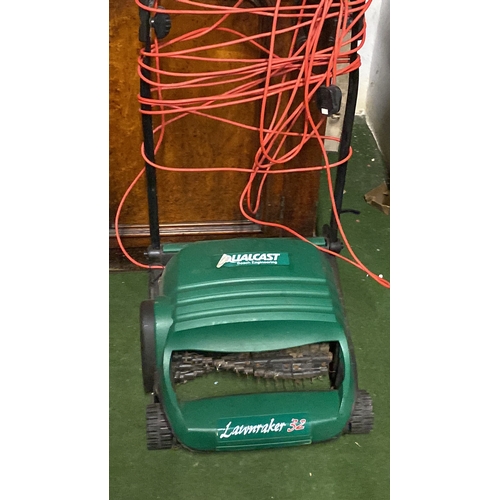 427 - An electric Qualcast lawnmower (untested).