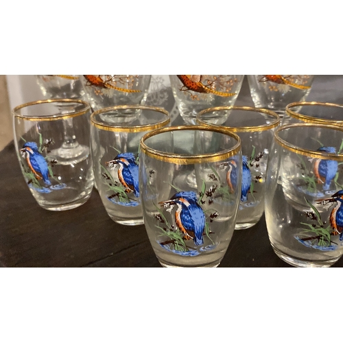 431 - A set of four and a set of six glasses with bird design and a glass decanter.