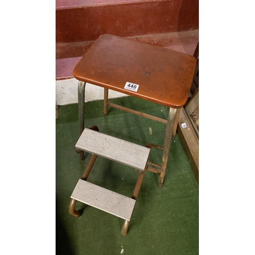 440 - A vintage folding step stool.