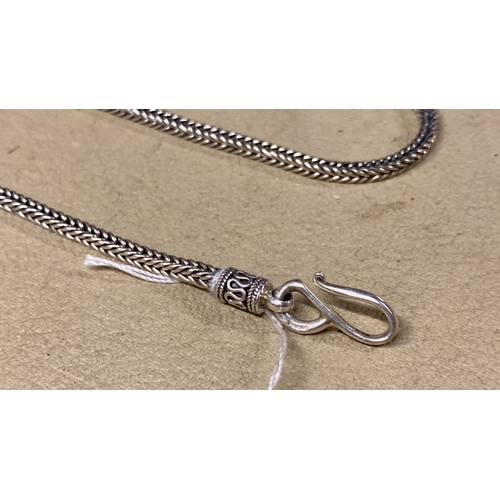 467 - A Sterling silver necklace.