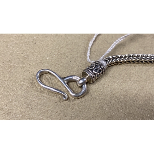 467 - A Sterling silver necklace.