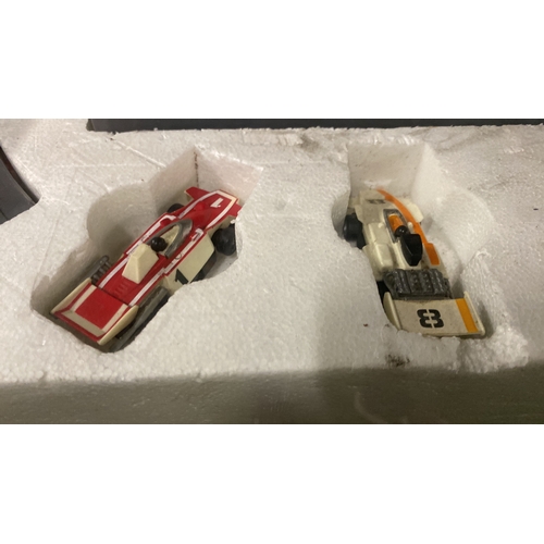 473 - A vintage Scalextric Electric Model Racing 18th edition racing car set.