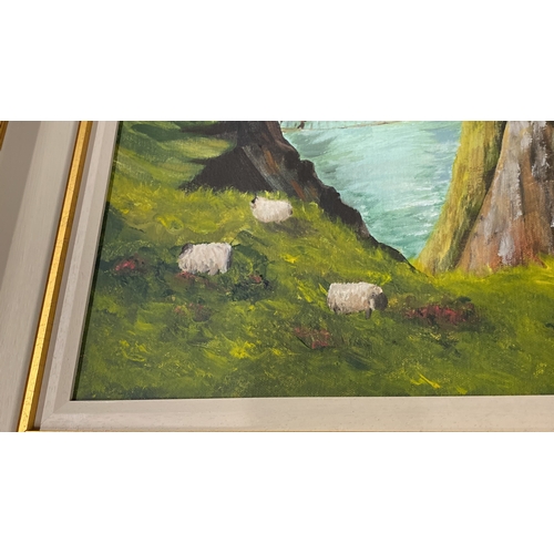 478 - A stunning framed oil 'Carrick-a-rede Rope Bridge' signed by Irish artist J White.