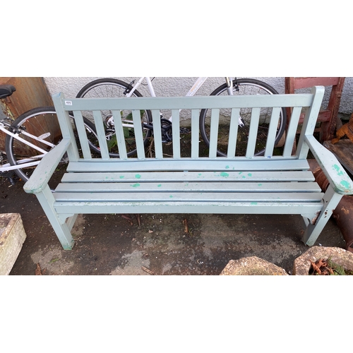 495 - A wooden garden bench.