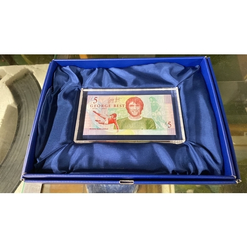 476 - A framed Ulster Bank George Best £5.00 note in its presentation box.