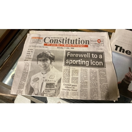 477 - A lot of newspapers cuttings on the death of Joey Dunlop.