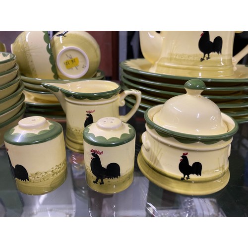 56 - A stunning collection of Zeller Keramik, 'Rooster' pottery tea and dinner service.