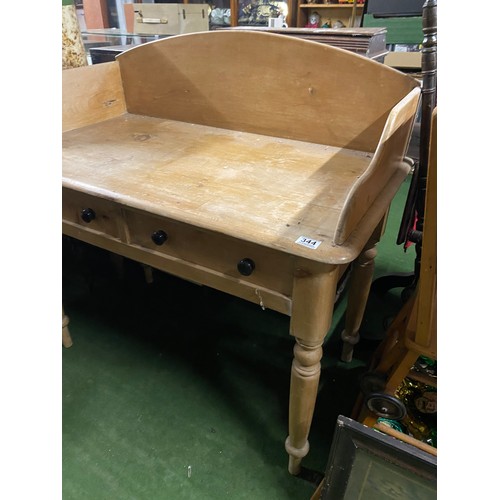 344 - An antique pine washstand.