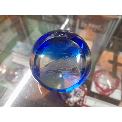 456 - Five vintage paperweight, the largest blue paperweight is etched with seal design.