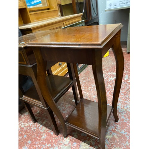 377 - A mahogany lamp/plantstand and side table with drawer.