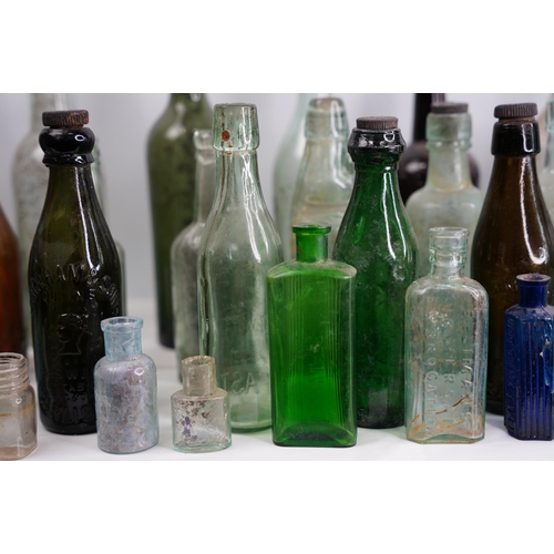 1 - A large lot of vintage & antique glass bottles to include F Underwood, Carlisle, E Johnson & Sons Op... 