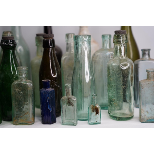 1 - A large lot of vintage & antique glass bottles to include F Underwood, Carlisle, E Johnson & Sons Op... 