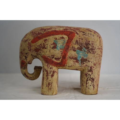 102 - A hand painted wooden elephant.