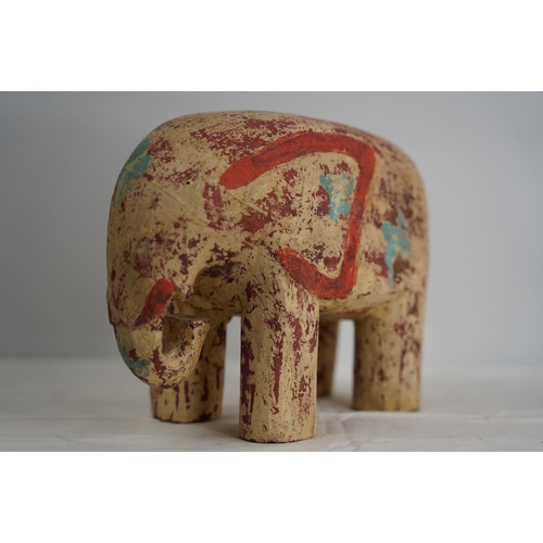 102 - A hand painted wooden elephant.