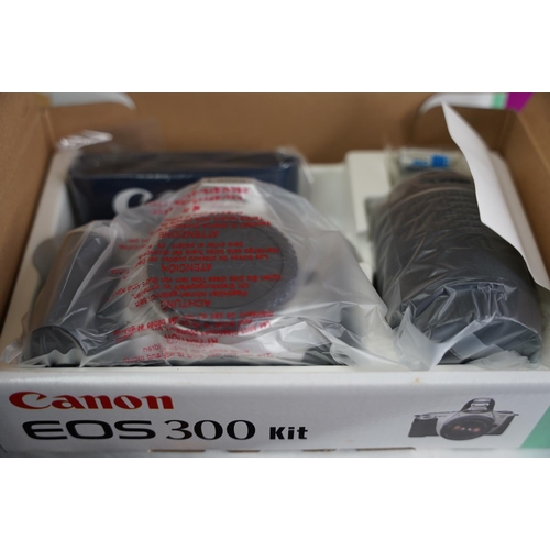 20 - A boxed Canon EOS 300 camera kit.