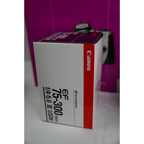 20 - A boxed Canon EOS 300 camera kit.