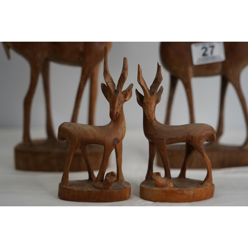 27 - Two pairs of vintage carved wooden Gazelle/ Antelope figures.