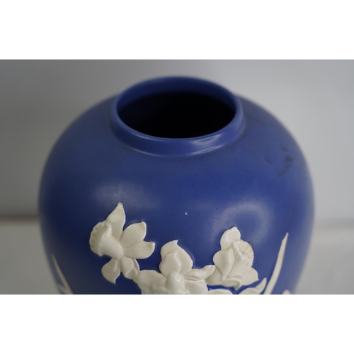 33 - A large jasperware vase in blue and white measuring approximately 28 cm high