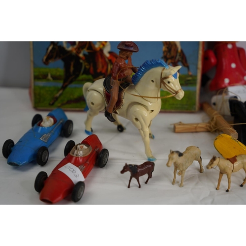 34 - An interesting mixed lot of old lead and plastic toy figures, animals, etc along with loose diecast,... 