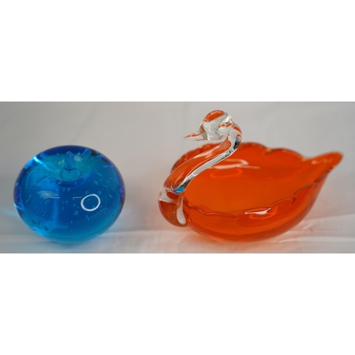 42 - A vintage blue glass paperweight in the shape of an apple and a retro orange glass swan dish.