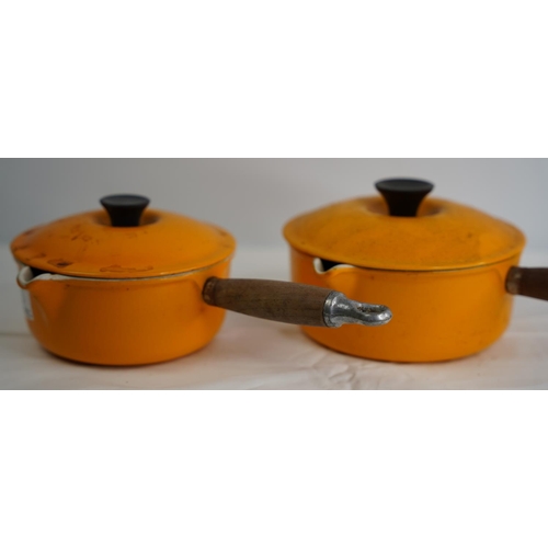 5 - Two vintage Le Creuset no 16 and no 18 lidded saucepans.