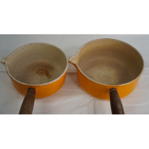 5 - Two vintage Le Creuset no 16 and no 18 lidded saucepans.