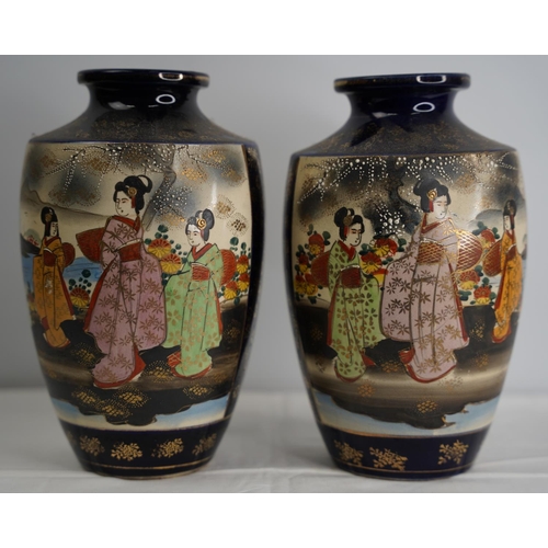 57 - A pair of Japanese Satsuma vases.