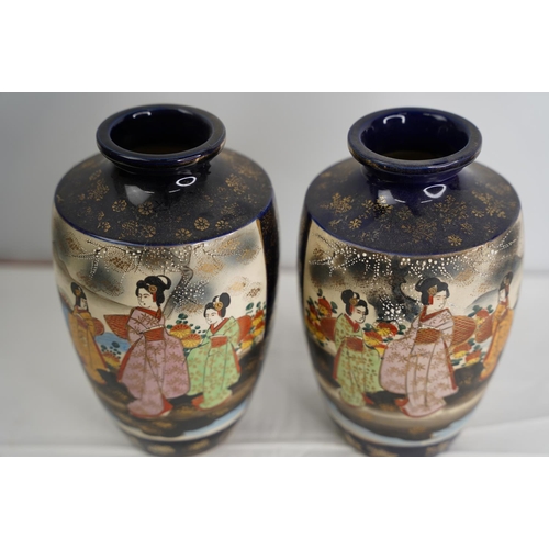 57 - A pair of Japanese Satsuma vases.