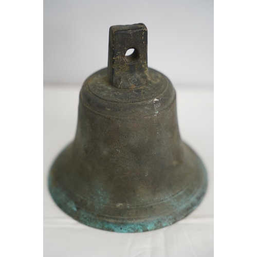 59 - An antique bronze bell.