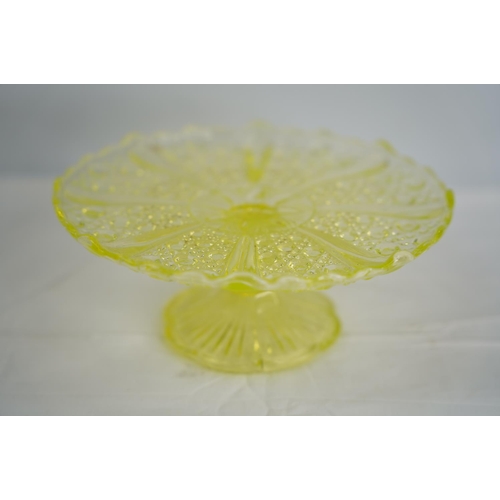 64 - A stunning vintage Uranium glass cake plate.