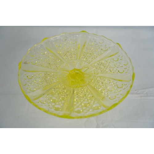 64 - A stunning vintage Uranium glass cake plate.