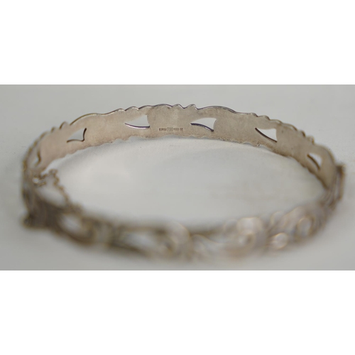 78 - A Sterling silver bangle.