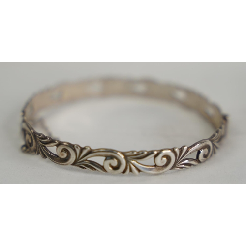 78 - A Sterling silver bangle.