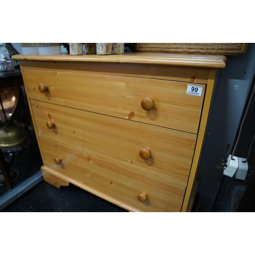 99 - A chest of three drawers.