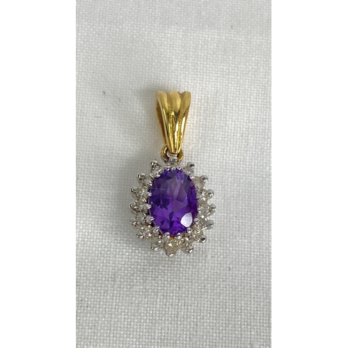 139 - An 18ct gold diamond and amethyst pendant.