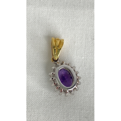 139 - An 18ct gold diamond and amethyst pendant.