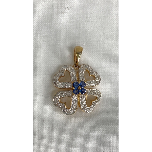 149 - A 9ct gold, sapphire and diamond pendant.