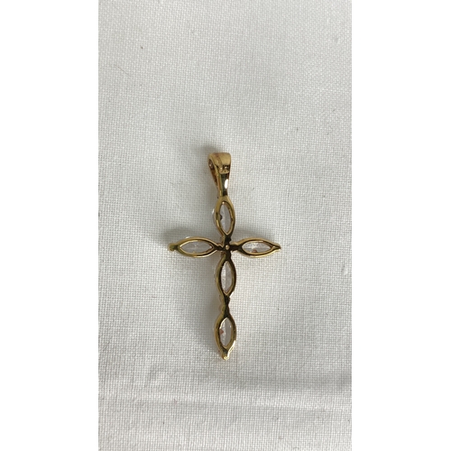 151 - A 9ct gold CZ cross pendant.