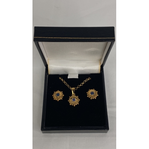 158 - A 9ct gold and sapphire diamond earrings, pendant and necklace set on a 18