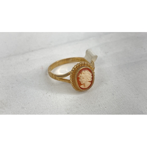 167 - A 9ct gold and cameo ring, size K.